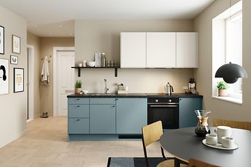 Litet blått Epoq kök i serien Trend Petrol och Warm White med integrerad ugn.