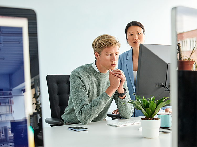 man on computer in office