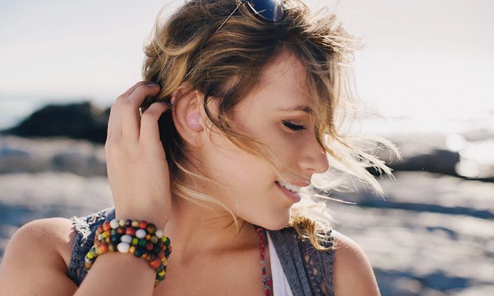 Woman wearing JBL headphones