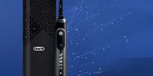 Oral-B Genius X black electric toothbrush with travel case