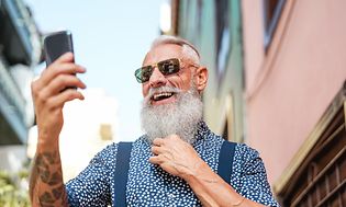 Older man looking at mobile