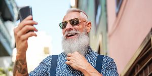 Older man looking at mobile