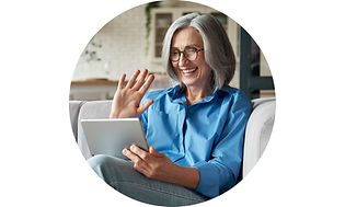 Round image of woman with tablet