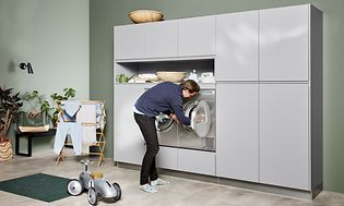 Man in laundry room