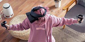 Woman-VR-gaming-in-a-living-room