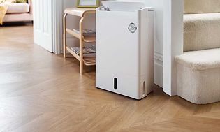 SDA - Dehumidifier - Dehumidifier in the middle of a living room