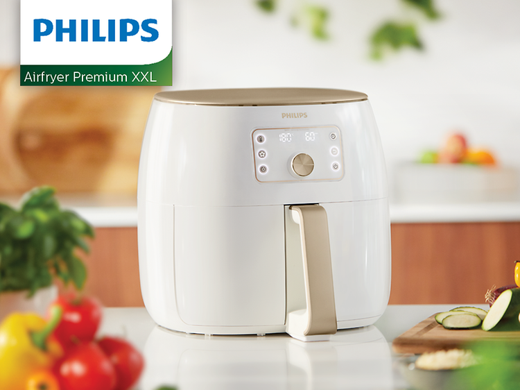 Philips Airfryer XXL on a table in a kitchen