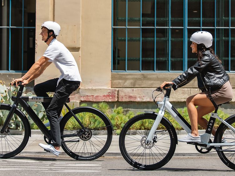 Two people on e-bike