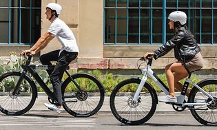 Two people on e-bike