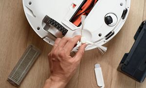 Robot vacuum cleaner - cleaning the sensors