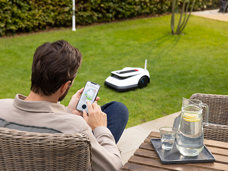 Ecovacs GOAT robotic lawn mower in the garden