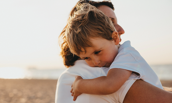 MDA - Beko - Woman holding baby at the beach
