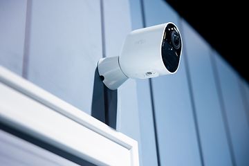 Surveillance camera on house