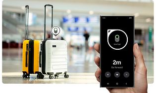 Samsung SmartTag2 Bluetooth trackers on suitcases hand holding smartphone with App to locate the tracker