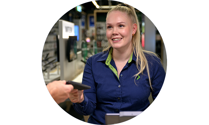 Elkjop employee with phone