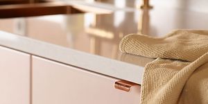 Epoq Trend Blush kitchen with Silestone worktop and a kitchen towel