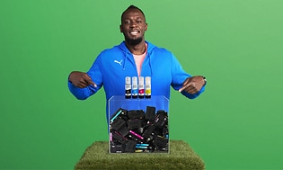 Printing with Epson - Usain Bolt holding refill ink bottles