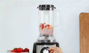 Bosch MultiTalent3 food processor with blender attachment filled with berries