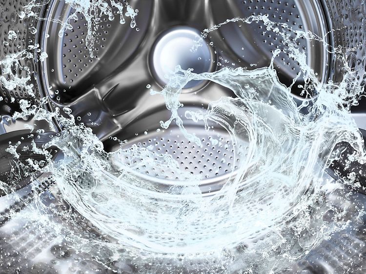 Water forming a wave inside washing machine drum