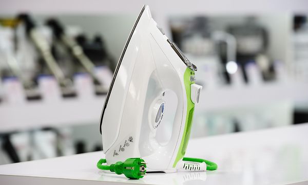 Iron in a shop with more irons in the background